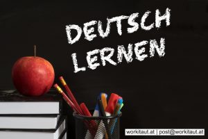 Schoolbooks, apple and chalkboard with the slogan German learning